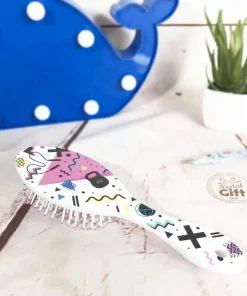 Petite brosse à cheveux style années 80