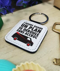 Porte clé “J’adore quand un plan se déroule sans accroc”