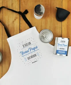 Tablier de cuisine dans sa boîte de conserve “Je suis un beau papa qui déchire”